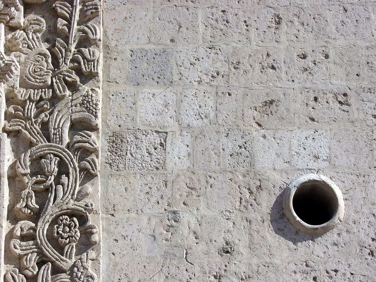 A colonial facade of white volcanic sillar stone in Arequipa's historic center