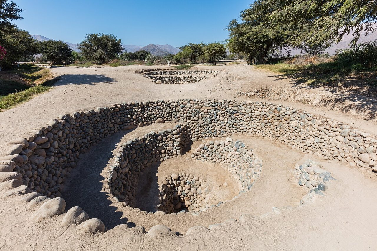 Spiral stone entrance of the Cantalloc Aqueducts in Nazca, Peru
