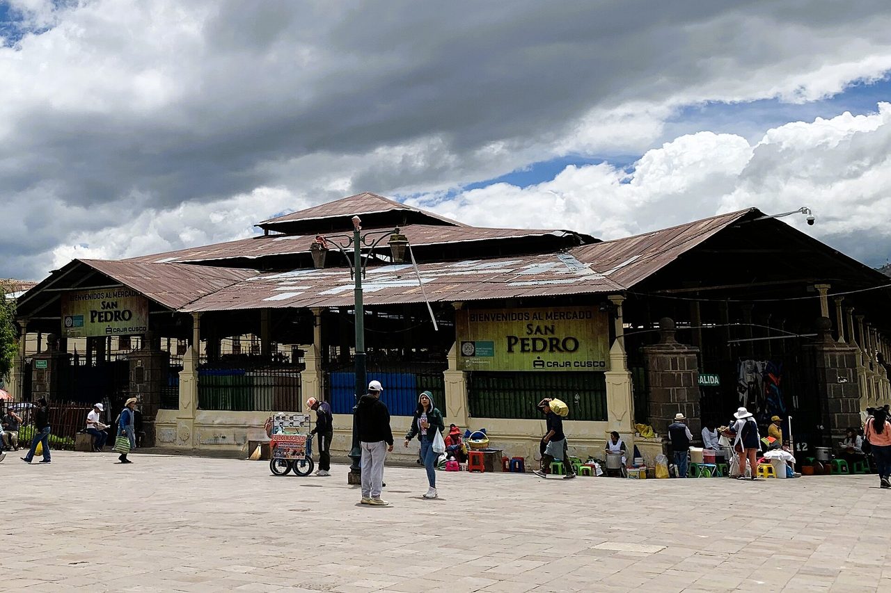 Produce and juice stalls inside Cusco's San Pedro market, where Peru's food prices are lowest