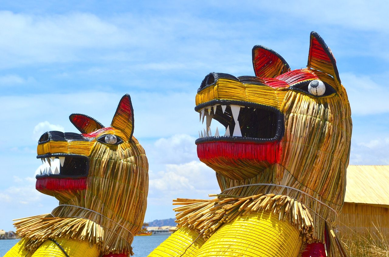 Totora reed boats with puma figureheads on Lake Titicaca, Peru