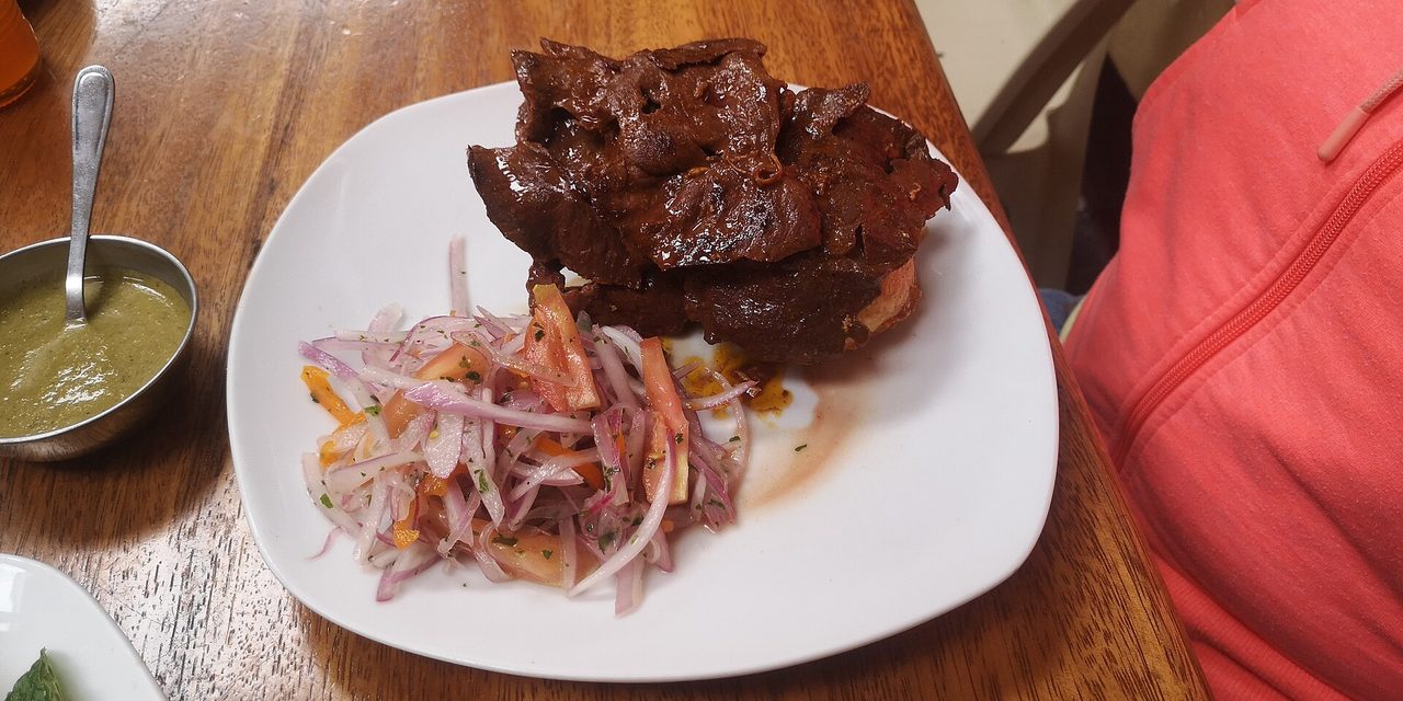 Anticuchos, grilled beef-heart skewers, a classic Peruvian street food
