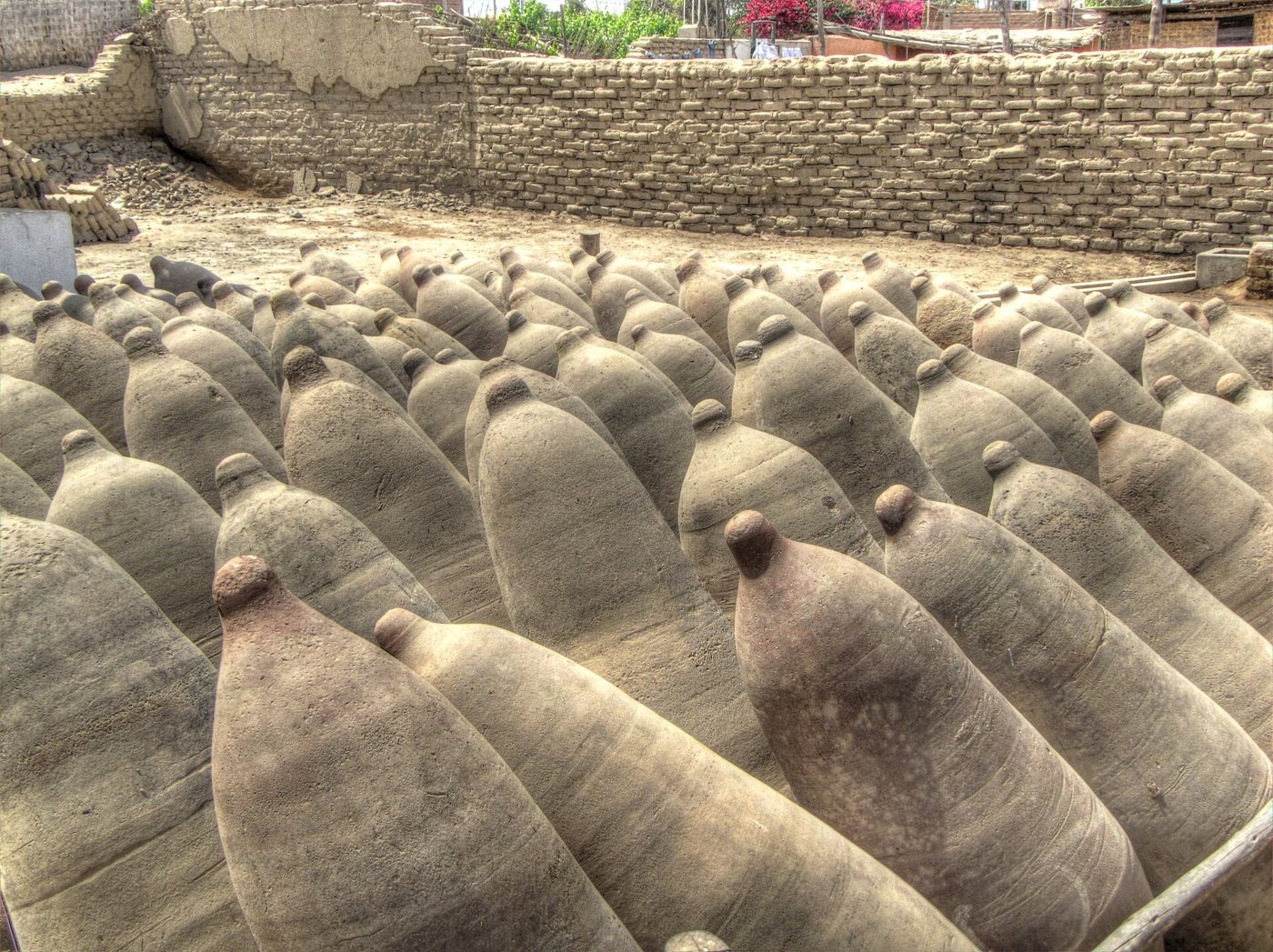 Traditional clay botijas once used to ferment pisco at Bodega El Catador near Ica, Peru