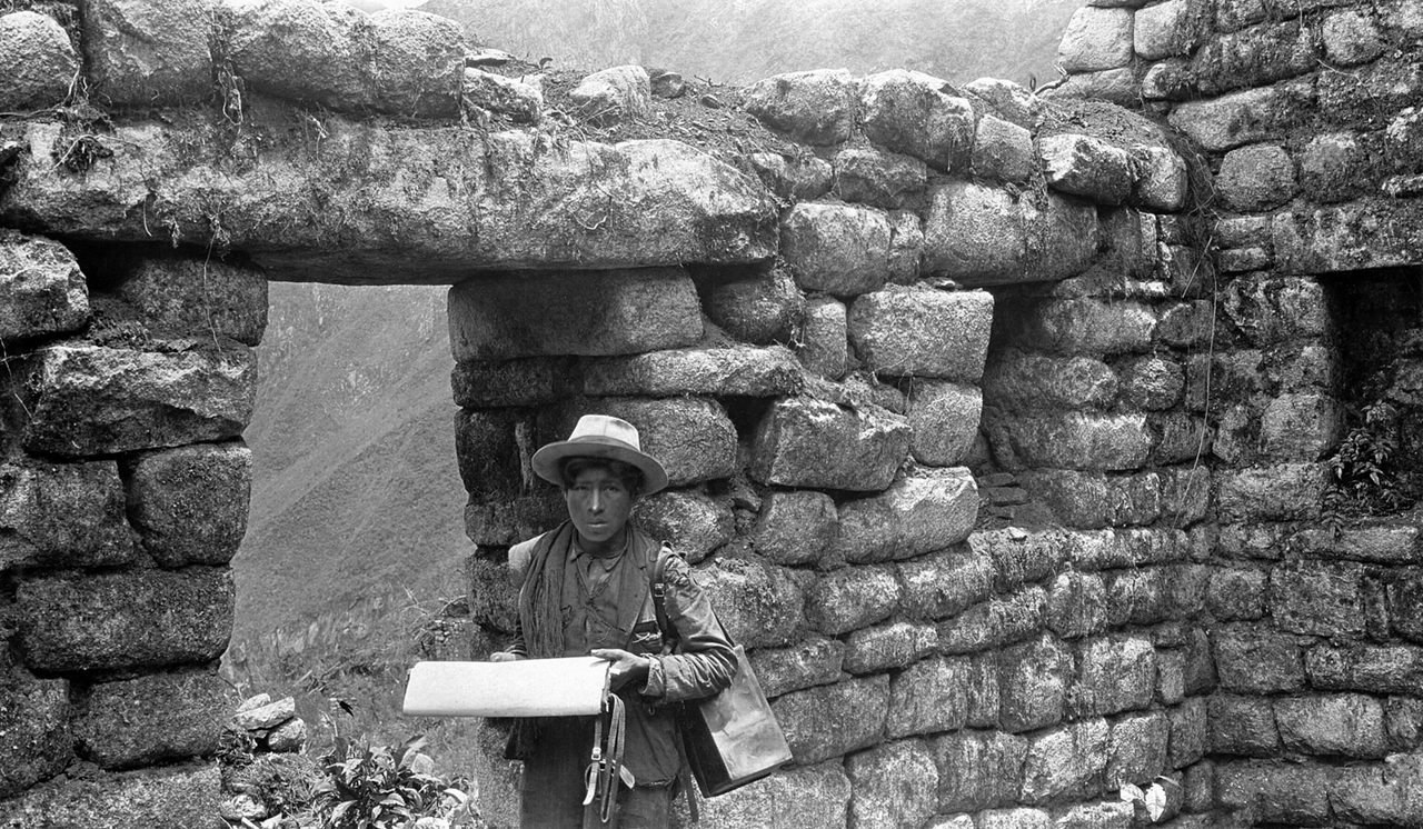 Machu Picchu photographed during the Bingham expeditions, before clearing was complete