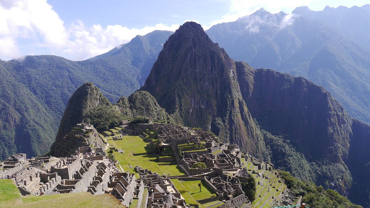 Visitors exploring the central plazas of the Machu Picchu citadel