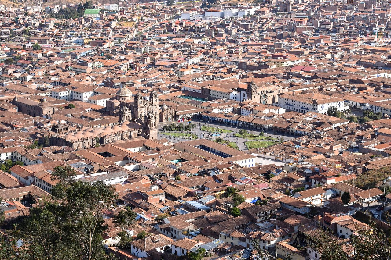 Cusco’s red-tiled roofs packed around the Plaza de Armas, seen from the hills above the city