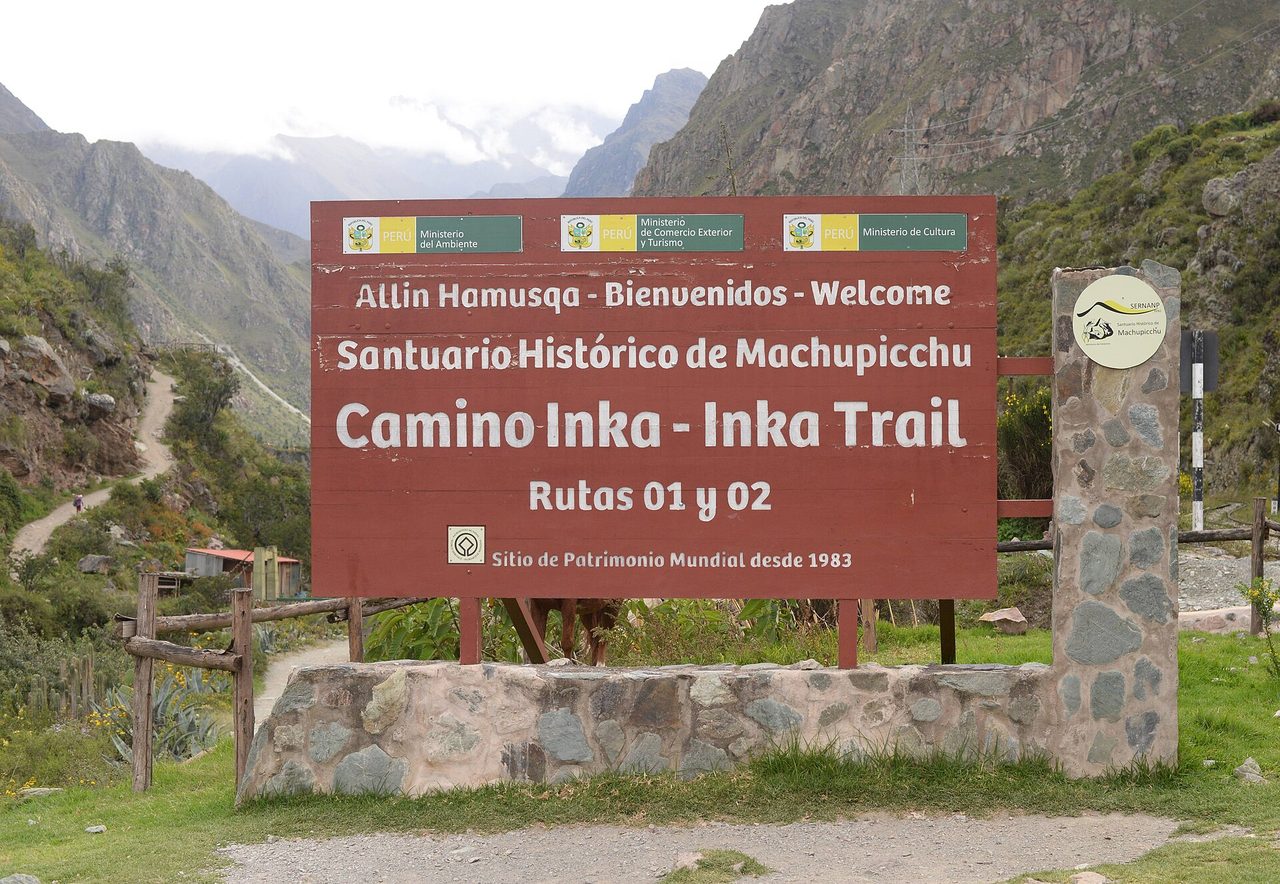 The official Camino Inka welcome sign at the entrance to the Machu Picchu Historic Sanctuary