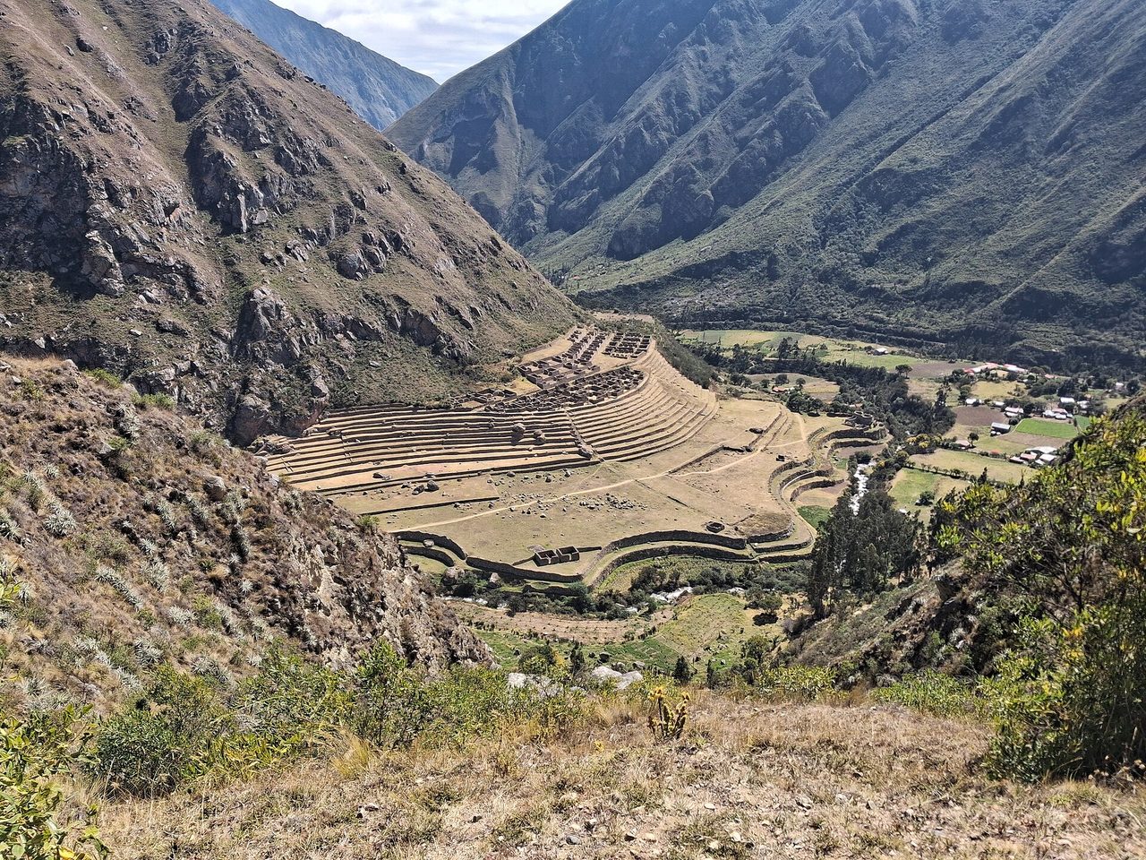 The terraces and stone enclosures of Willkaraqay above Patallacta, seen from high on the Inca Trail on day one