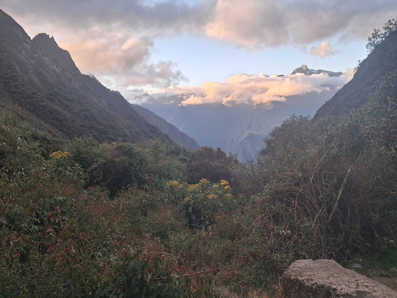 Cloud settling in the valley at dusk from the Pacaymayo campsite on the Inca Trail