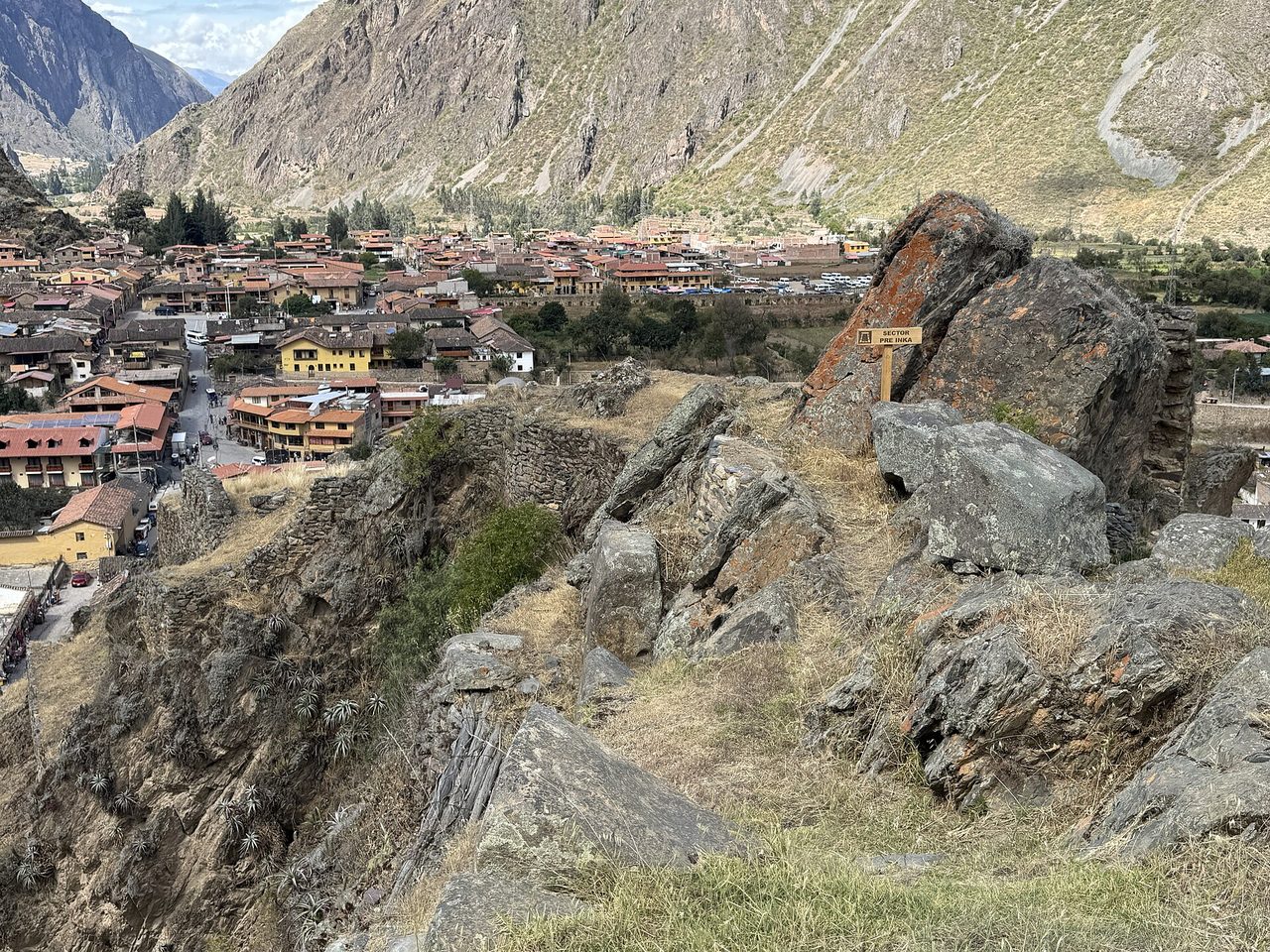 Boulders of the pre-Inca sector at the top of the Ollantaytambo archaeological site, looking down over the town and the valley floor