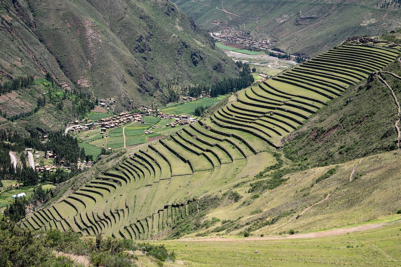 The terrace amphitheatre at Pisac falling away toward the Sacred Valley floor and the town below