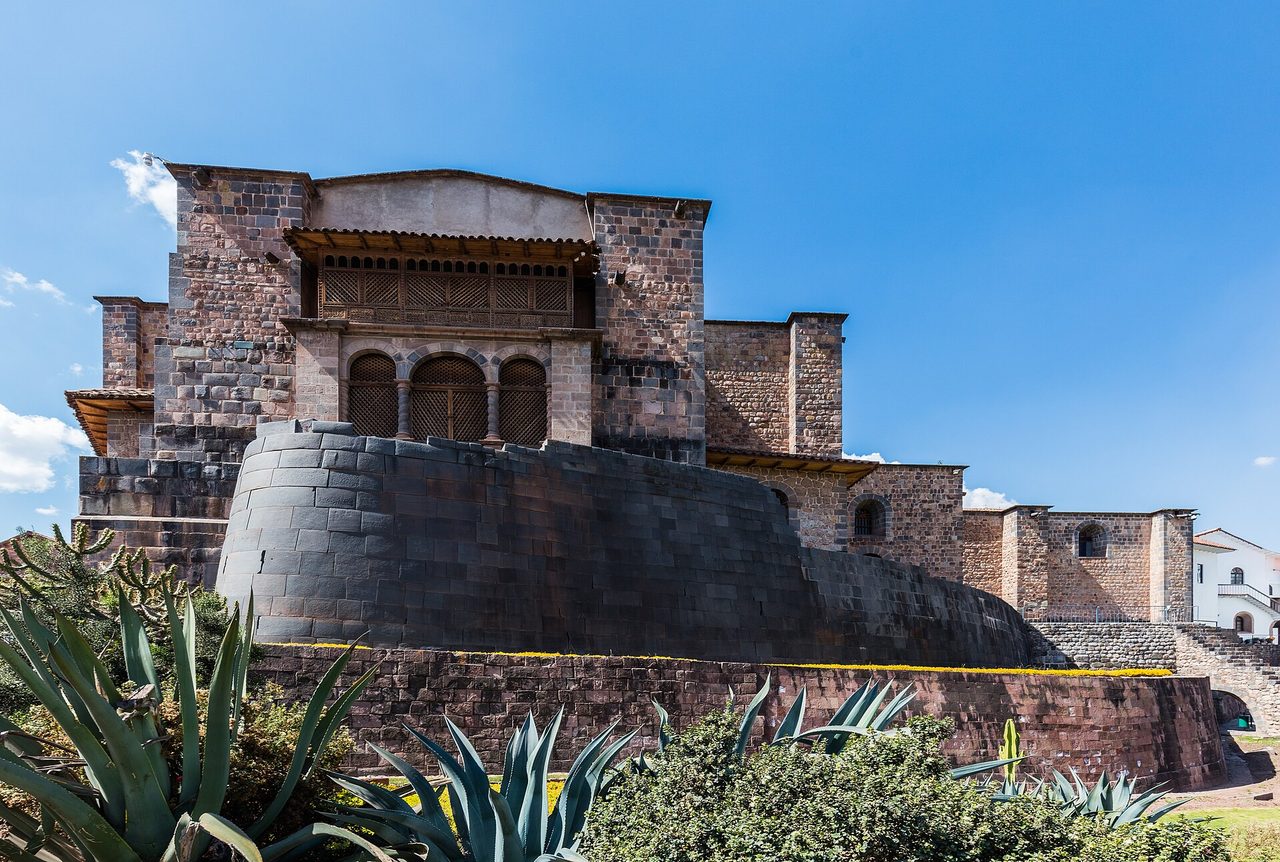 The curved Inca wall of Qorikancha with the colonial church of Santo Domingo built on top of it